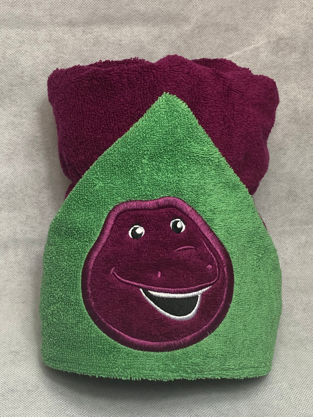 Dino character hooded towel